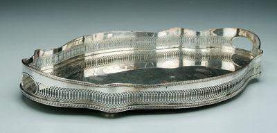 Appraisal: Silver plated tray cartouche form openwork gallery two handles scroll