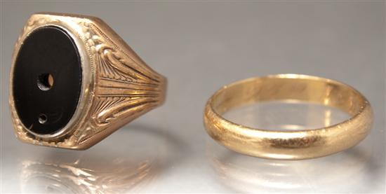 Appraisal: Gentleman's K yellow gold wedding band together with a K