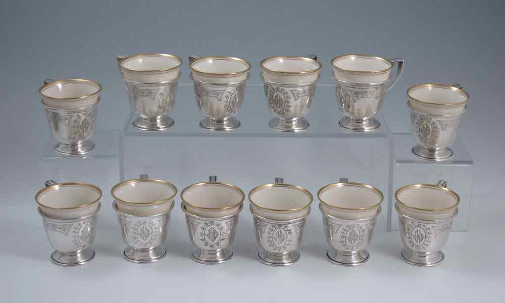 Appraisal: STERLING BALTIMORE SILVERSMITHS LENOX CHINA DEMITASSE CUPS Gold rimmed Lenox