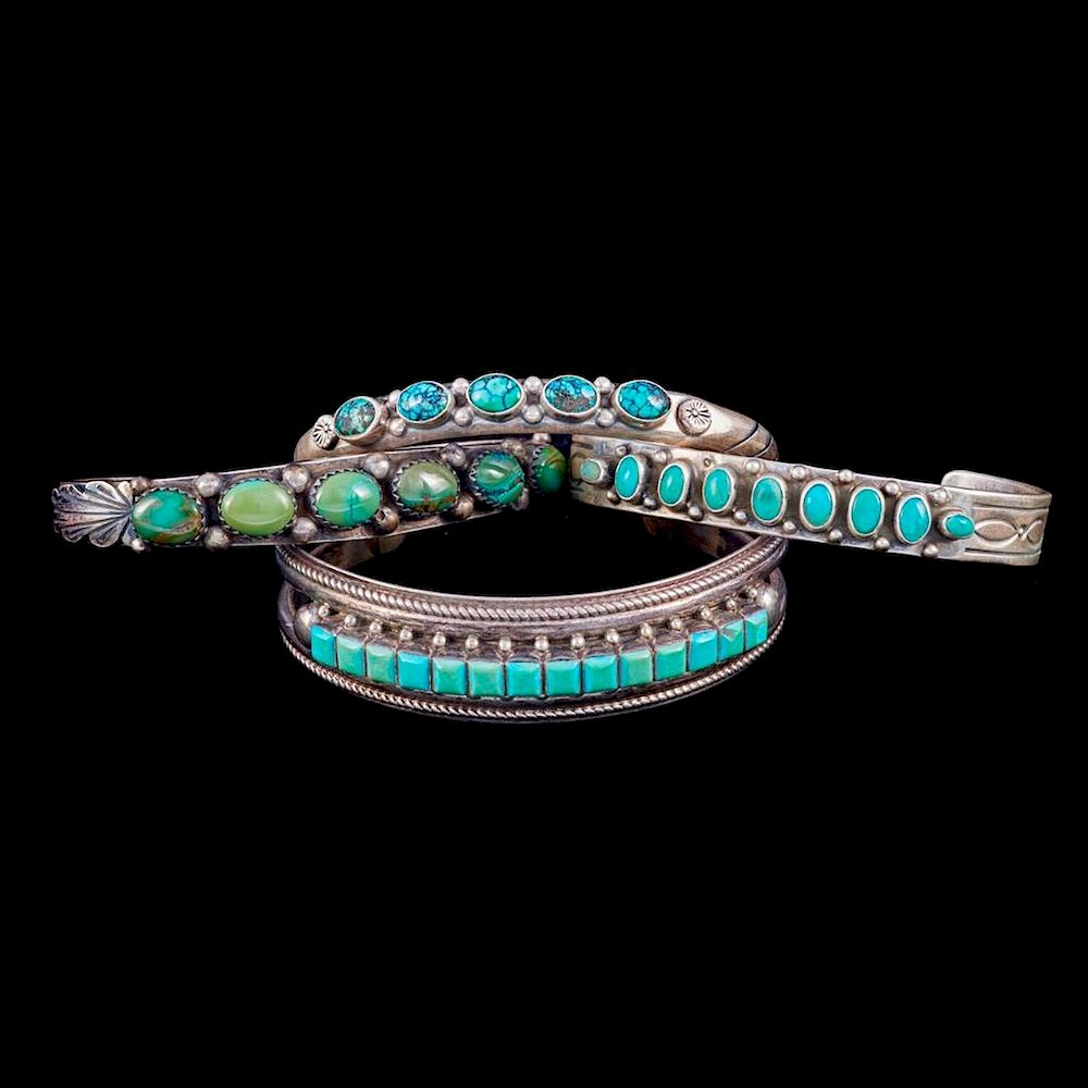 Appraisal: NAVAJO CUFF BRACELETS Four old pawn turquoise and silver cuff