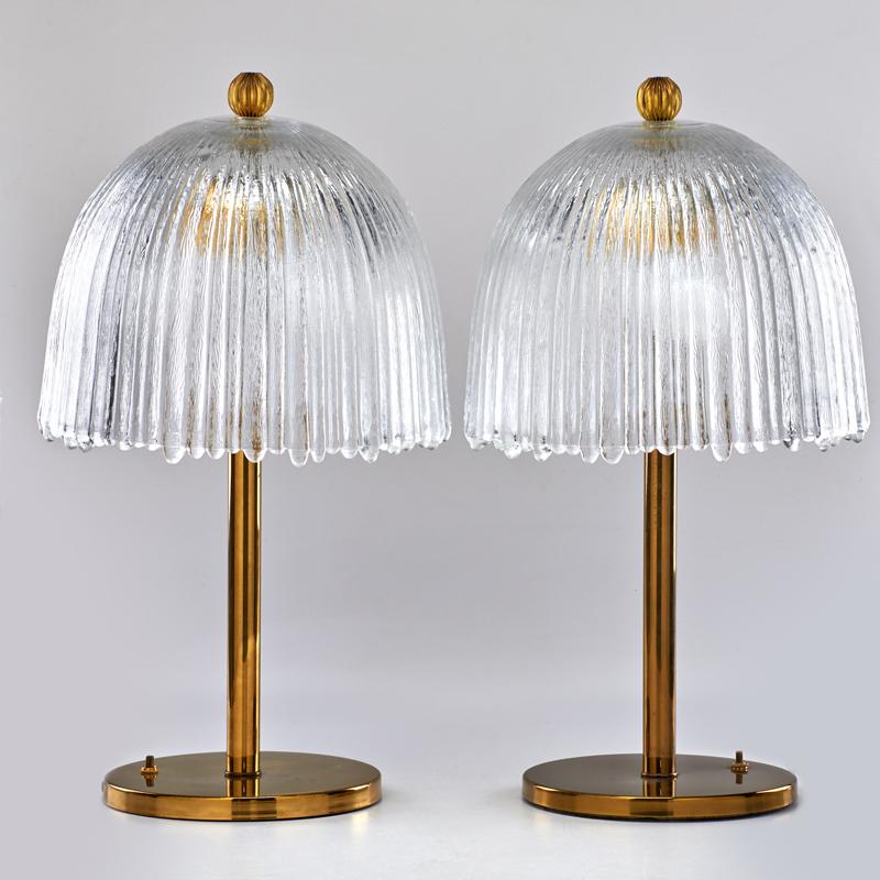 Appraisal: MODERN LIGHTING Two adjustable table lamps Brass glass Unmarked As