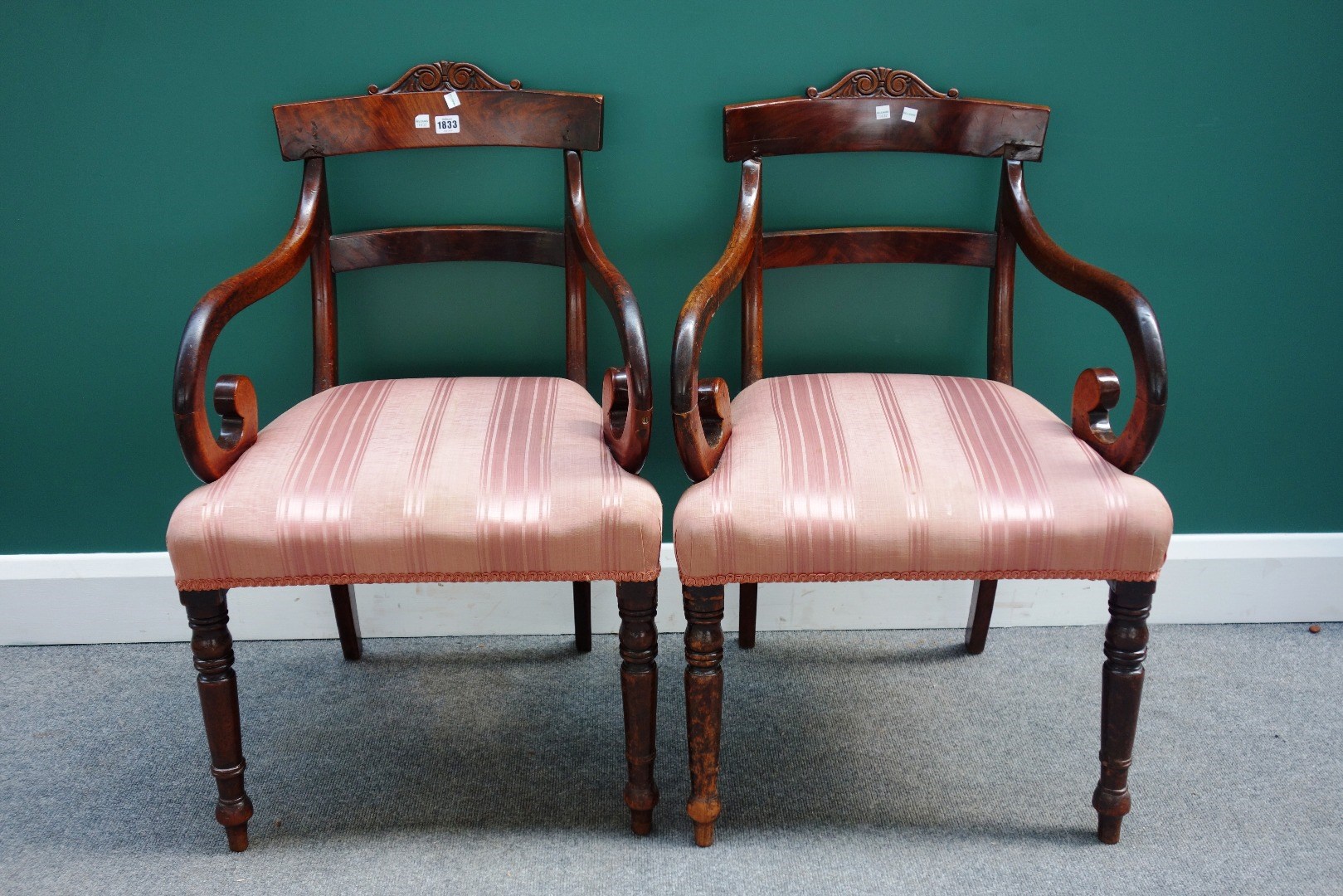 Appraisal: A pair of William IV mahogany framed carver chairs with