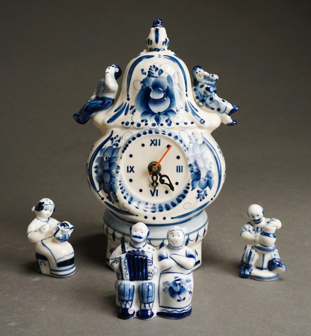 Appraisal: Russian Blue and White Porcelain Clock and Three Figurines