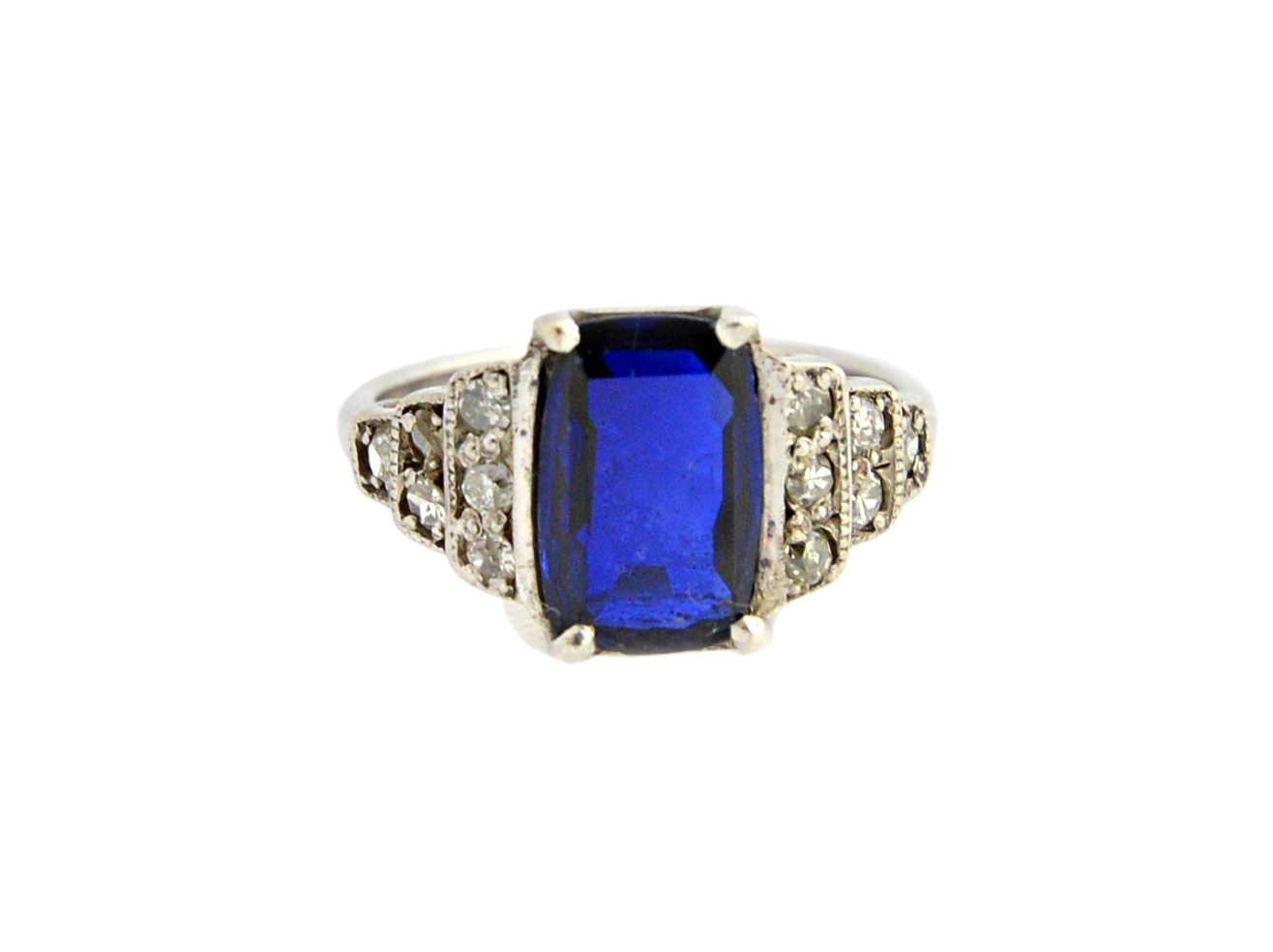 Appraisal: A white gold sapphire and diamond ring claw set with