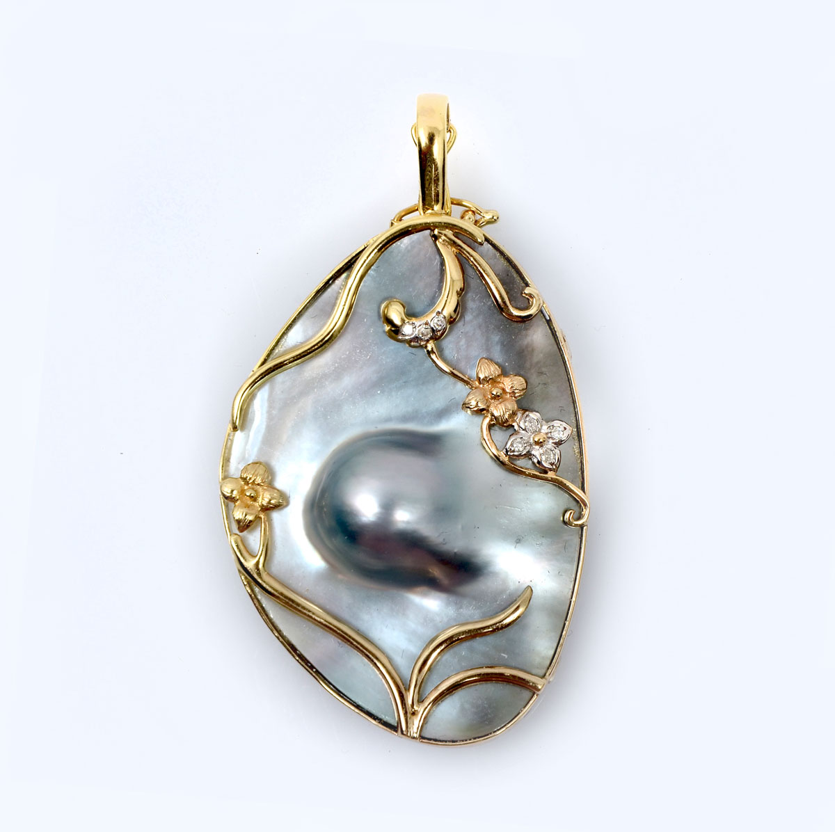 Appraisal: K OVAL BLISTER PEARL PENDANT ENHANCER '' h x ''