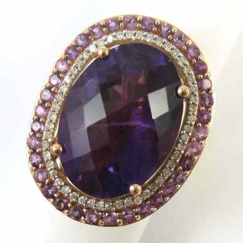 Appraisal: AMETHYST DIAMOND AND FOURTEEN KARAT GOLD RING set with round-cut