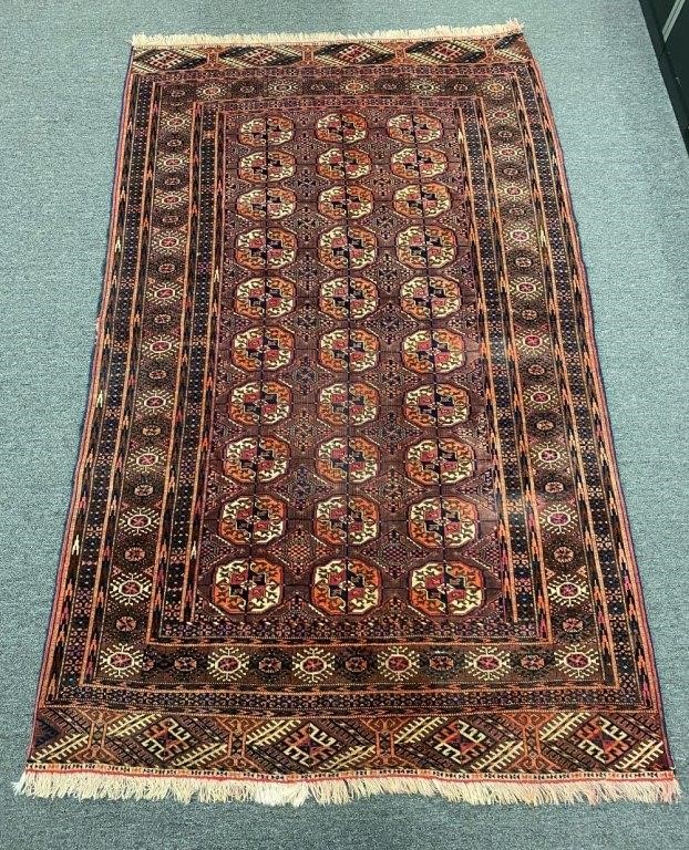 Appraisal: Bokhara center hall carpet with center medallions '- x '-