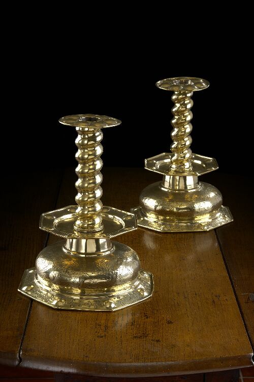 Appraisal: A pair of th century Dutch brass table candlesticks each