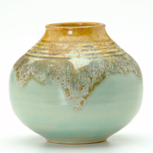 Appraisal: ROSEVILLE Imperial II bulbous vase covered in a frothy yellow