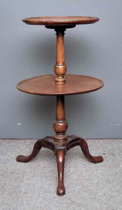 Appraisal: A mahogany circular two tier dumb waiter of Georgian design