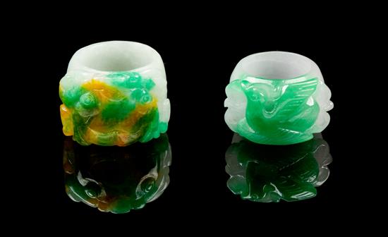 Appraisal: Sale Lot Two Jadeite Archer's Rings the first depicting a