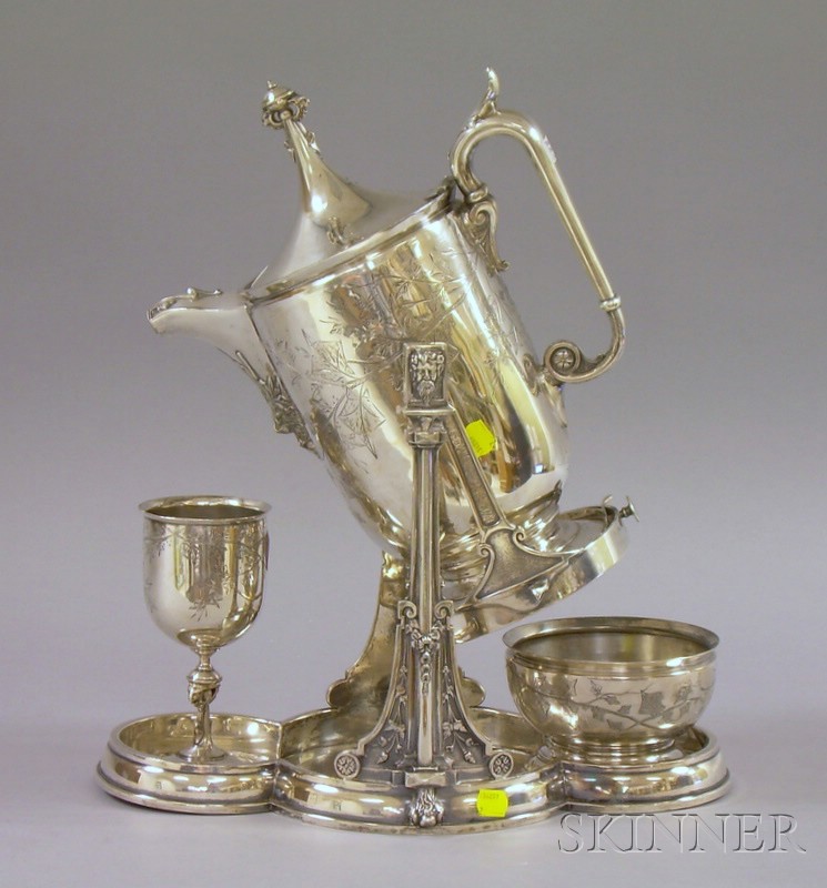 Appraisal: Classically Decorated Reed Barton Tipping Ice Water Pitcher Water Glass