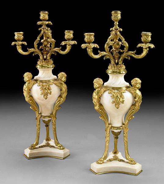 Appraisal: A pair of Louis XVI style gilt bronze and marble