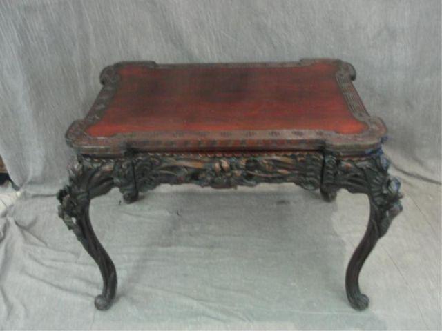 Appraisal: Highly Carved Asian Drawer Partners Desk From a prominent New