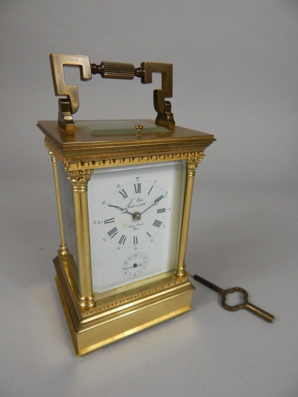 Appraisal: A modern brass carriage clock the dial bearing the name