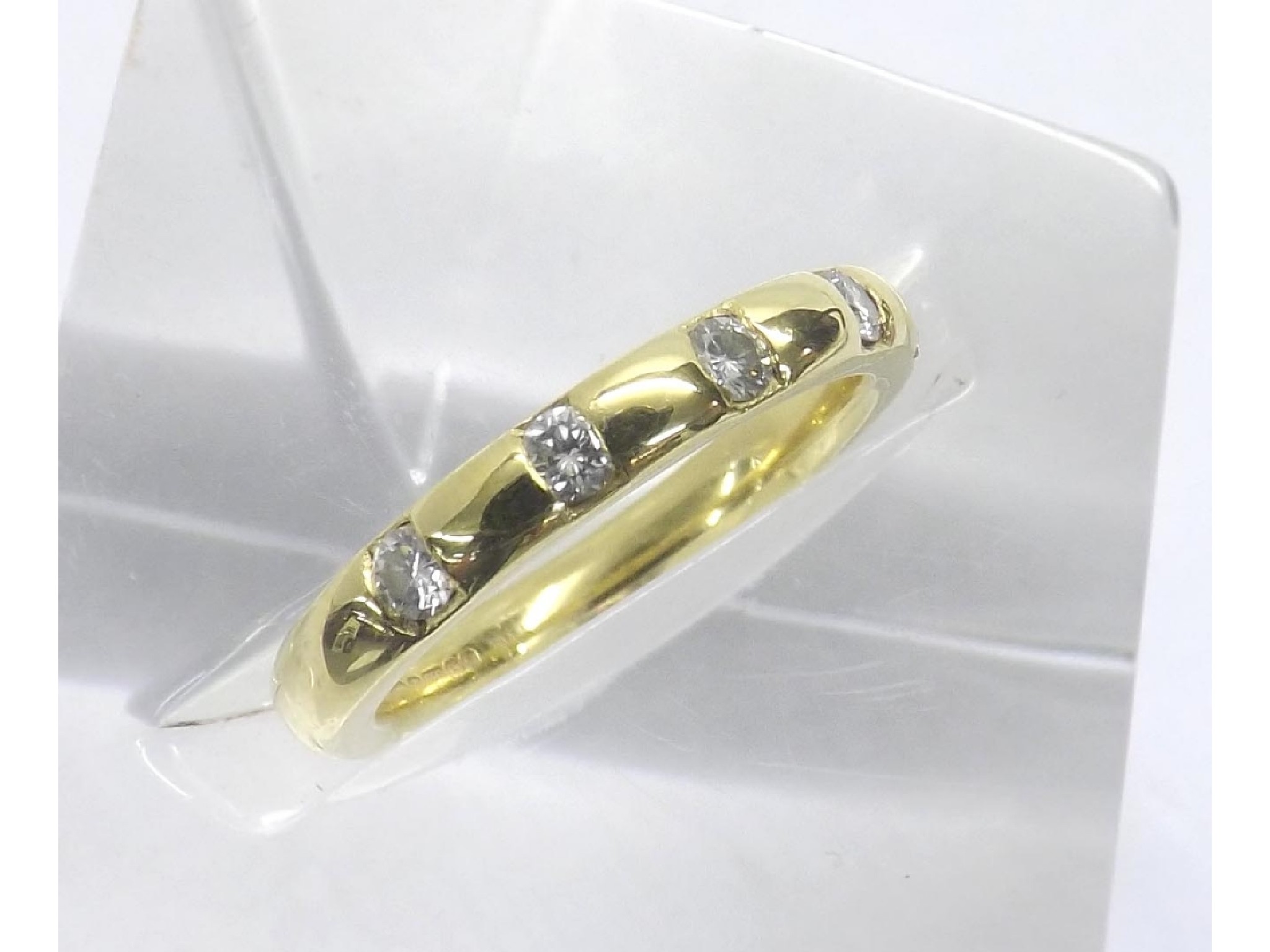 Appraisal: - -a Modern ct yellow gold five stone band ring