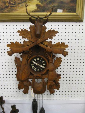 Appraisal: German Black Forest Carved Wooden CooCoo Clock game deer decor