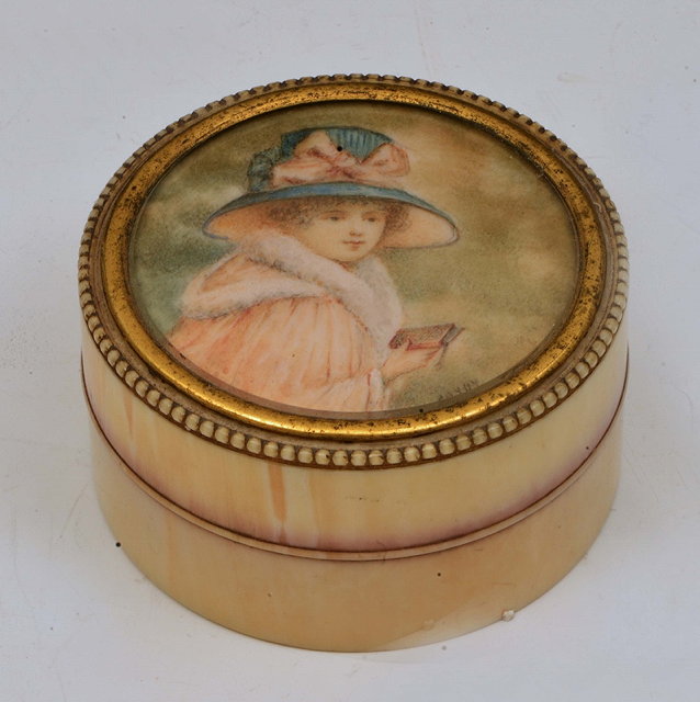 Appraisal: AN IVORY CIRCULAR BOX AND COVER inset a miniature portrait