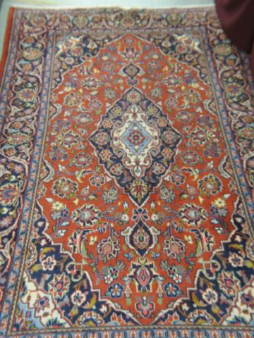 Appraisal: Kashan Persian Handmade Rug central medallion florals red field '