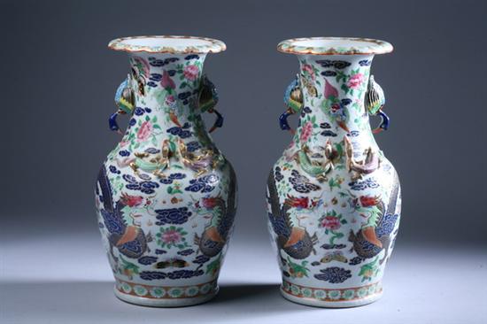 Appraisal: PAIR CHINESE FAMILLE ROSE PORCELAIN VASES th century Painted to