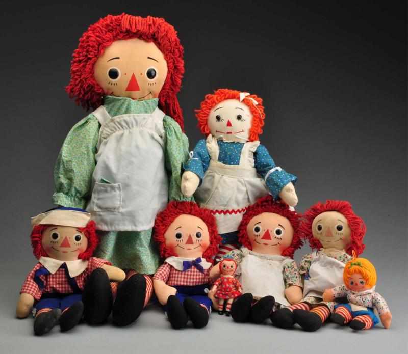 Appraisal: Lot of Raggedy Ann Andy Dolls Description Ann with heart