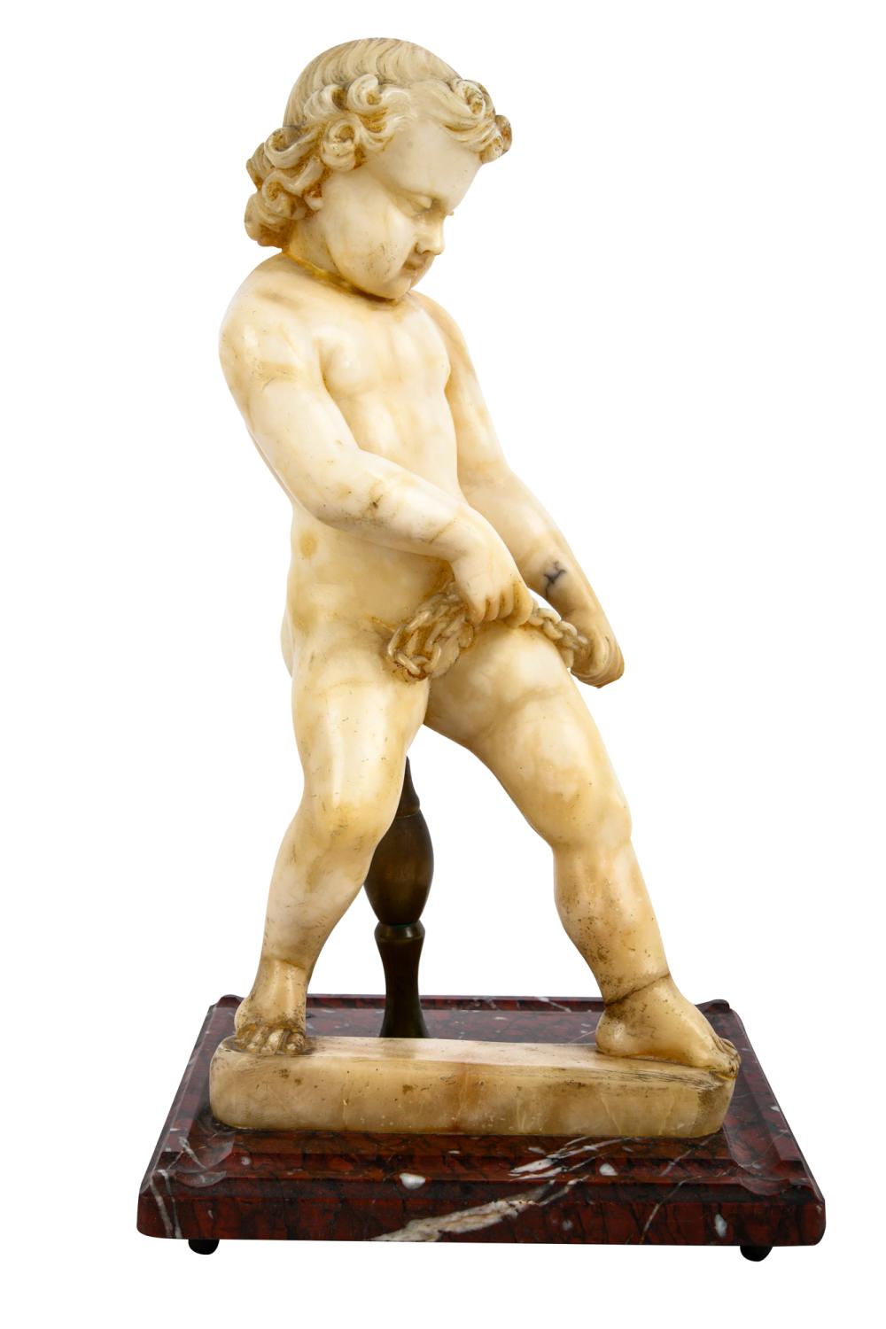 Appraisal: CARVED RUSSIAN ALABASTER CHERUBon a rouge marble plinth inches high