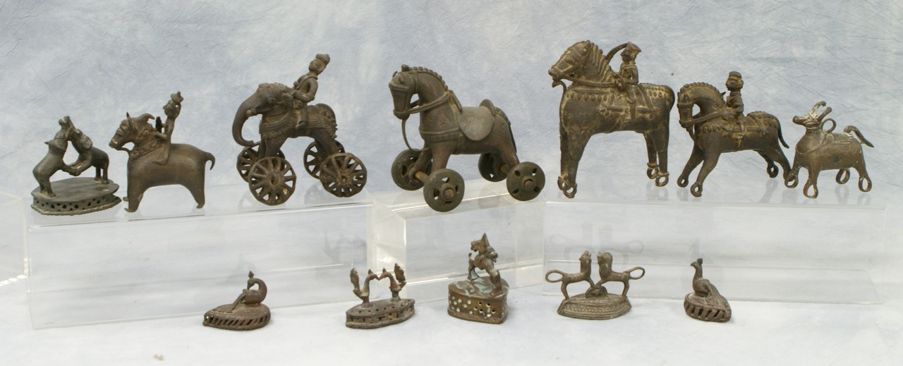 Appraisal: pieces of Indian brass including temple toys tallest