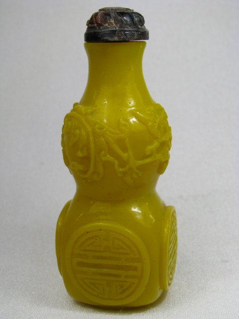 Appraisal: Chinese yellow glass snuff bottle double gourd shape with carved