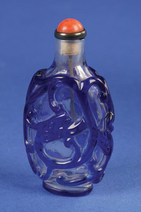 Appraisal: A CLEAR GLASS BOTTLE with blue overlay of two Chilong