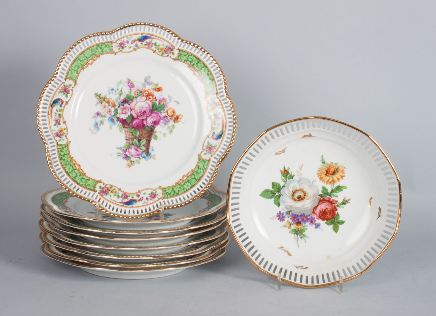 Appraisal: Eight Schumann reticulated porcelain plates early th century floral and