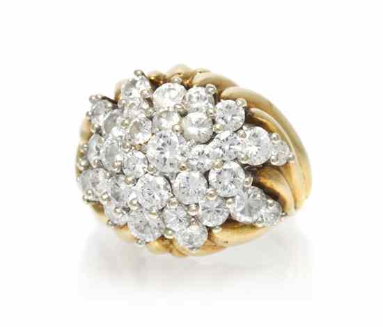 Appraisal: An Karat Gold and Diamond Cluster Ring containing round brilliant