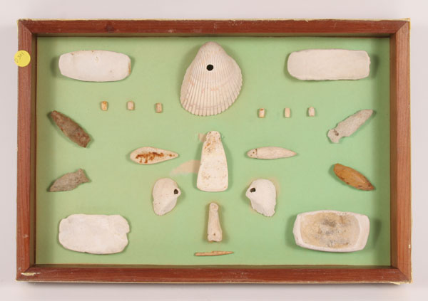 Appraisal: Two frames D with shell bone and flint Artifacts from