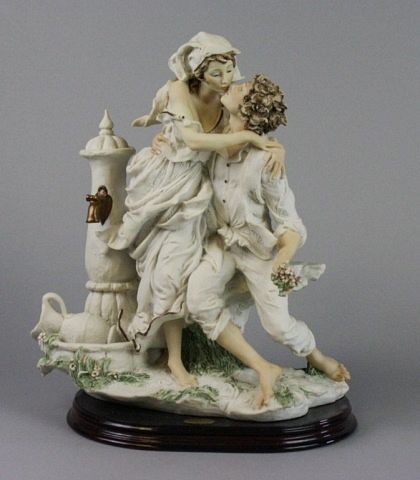 Appraisal: Giuseppe Armani Porcelain Figure Group Bisque porcelain figure group Love