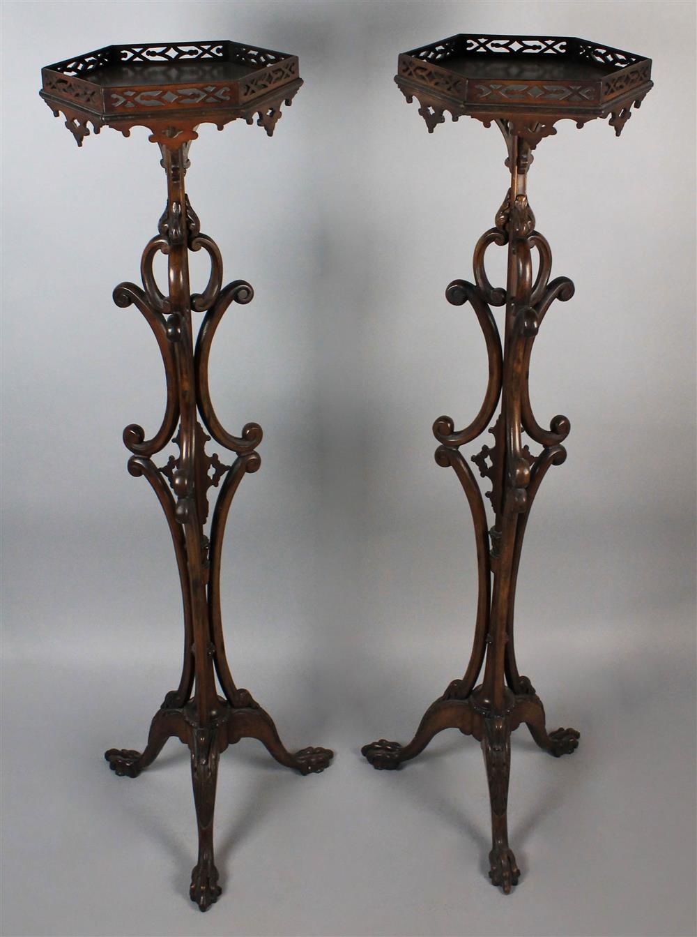 Appraisal: PAIR OF CHINESE CHIPPENDALE STYLE MAHOGANY PLANT STANDS each having