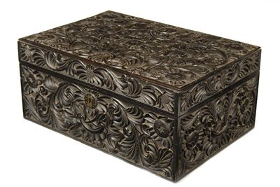 Appraisal: A late th century Anglo-Indian carved ebony work box Ceylon