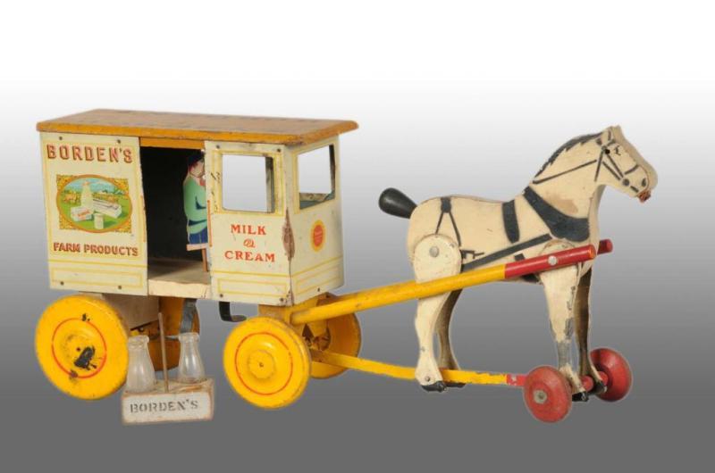 Appraisal: Rich Toys Borden's Milk Wagon Toy Description Pulled by articulated