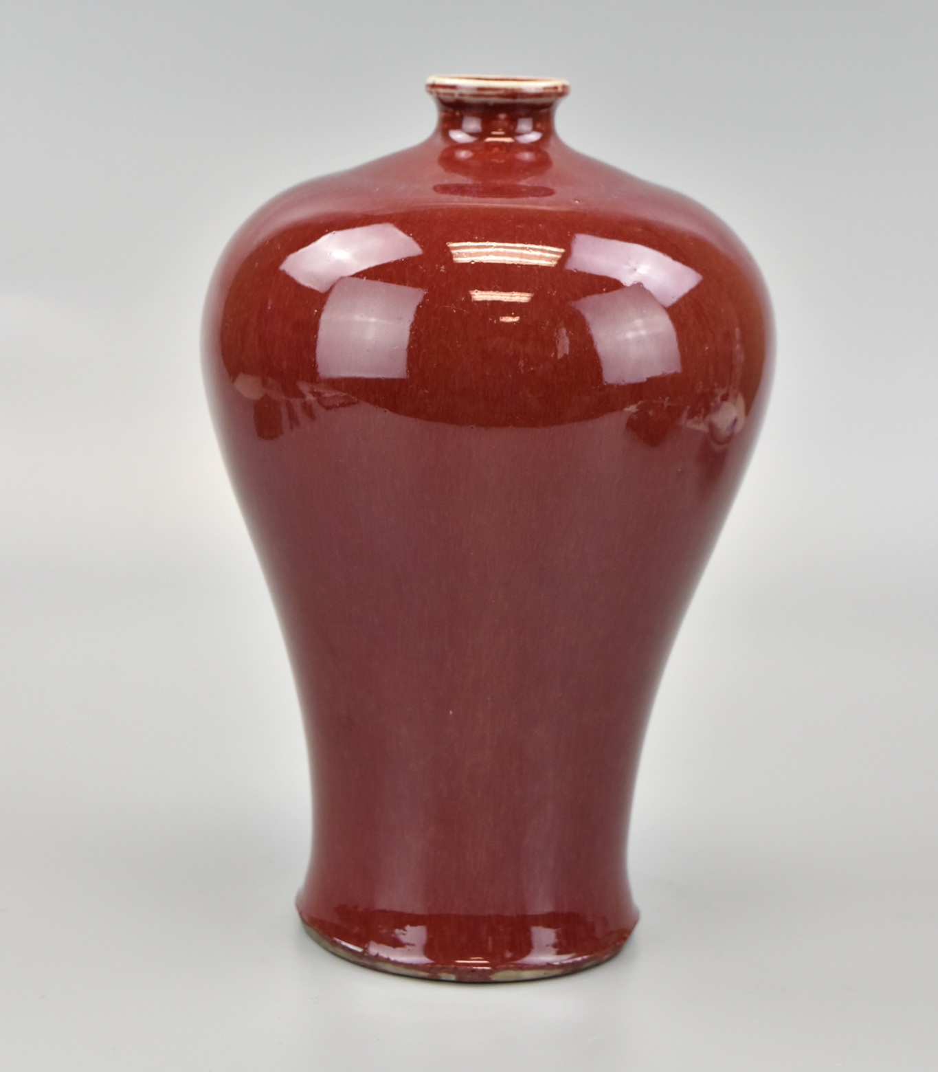 Appraisal: Chinese red glazed Meiping style vase in characteristic style of