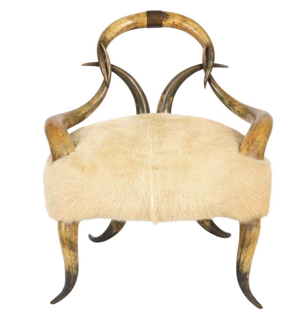 Appraisal: HORN CHAIR WITH CREAM COLORED FUR SEATHorn chair with fur