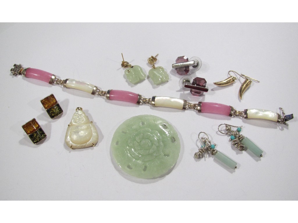 Appraisal: Lot comprising jade items to include disc pendant gold mounted