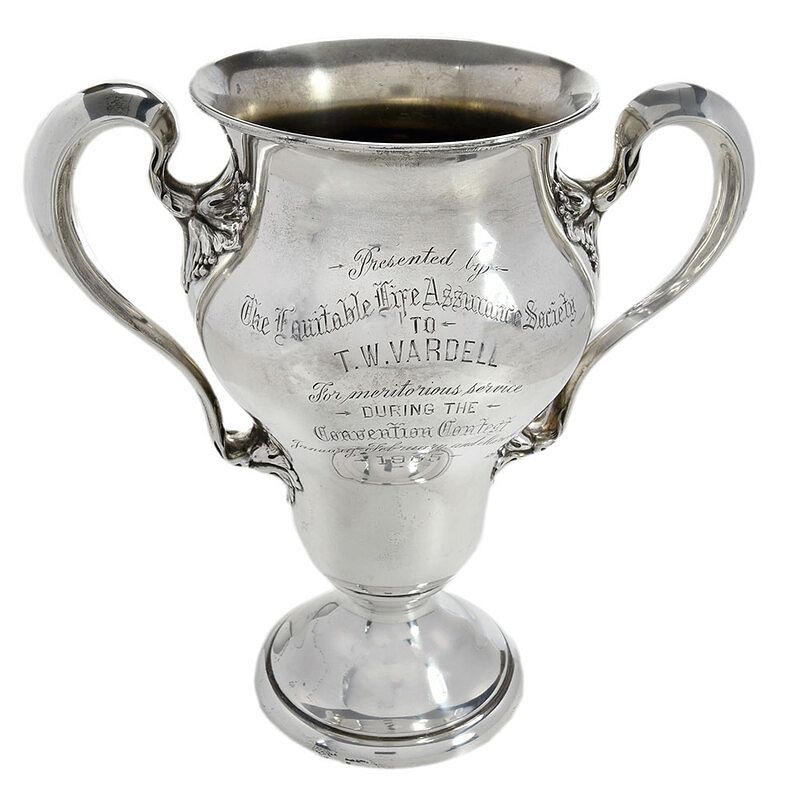 Appraisal: Sterling Loving Cup Trophy American urn form with two scroll