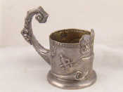 Appraisal: A white metal tests silver copy of a tea glass