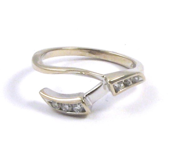 Appraisal: DIAMOND AND FOURTEEN KARAT GOLD RING GUARD set with six