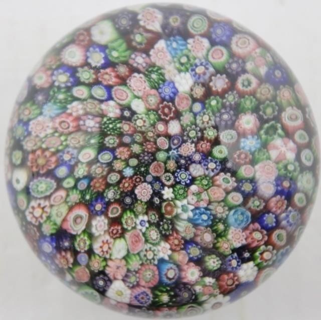 Appraisal: CLICHY CLOSE PACK MILLEFIORI PAPERWEIGHT WITHWHITE PETAL DESIGN ON BASE