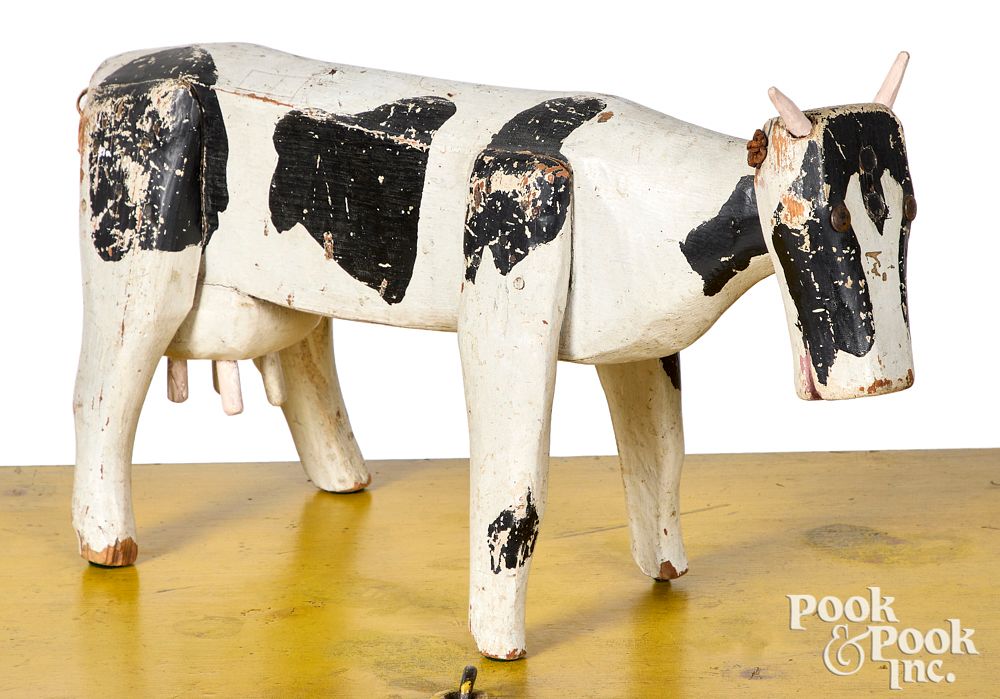 Appraisal: Folk art carved and painted cow early th c Folk