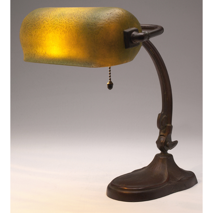 Appraisal: Handel lamp bronzed metal adjustable base holding a Mosserine glass