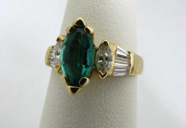 Appraisal: k yellow gold marquise shaped emerald ring approx ct with