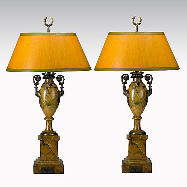 Appraisal: PAIR OF TOLEWARE LAMPSUrn form with brass plaques originally fitted