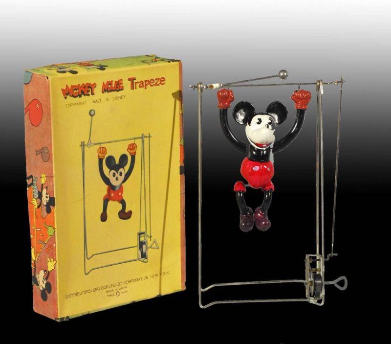 Appraisal: Disney Mickey Mouse Trapeze Wind-Up Toy in O B Description