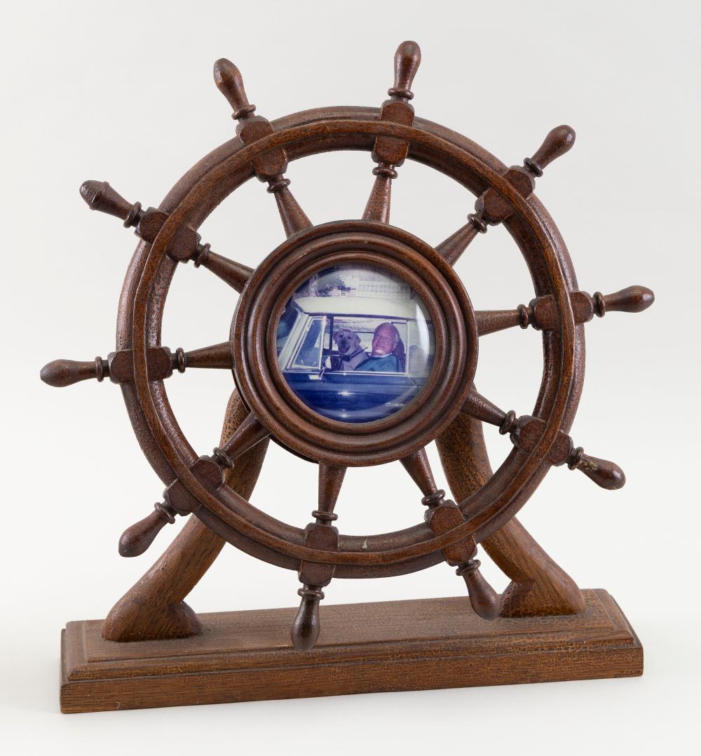 Appraisal: CARVED WALNUT SHIP'S WHEEL PICTURE FRAME FIRST HALF OF THE