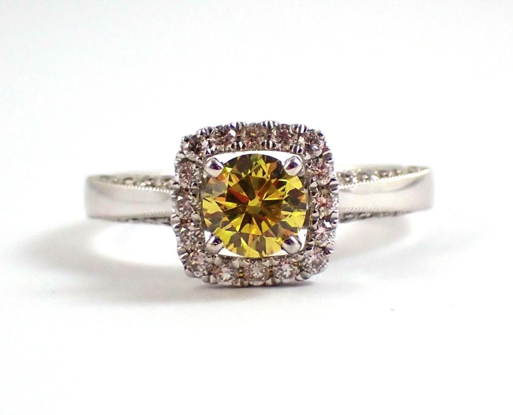 Appraisal: FANCY YELLOW DIAMOND AND FOURTEEN KARAT GOLD RING The k